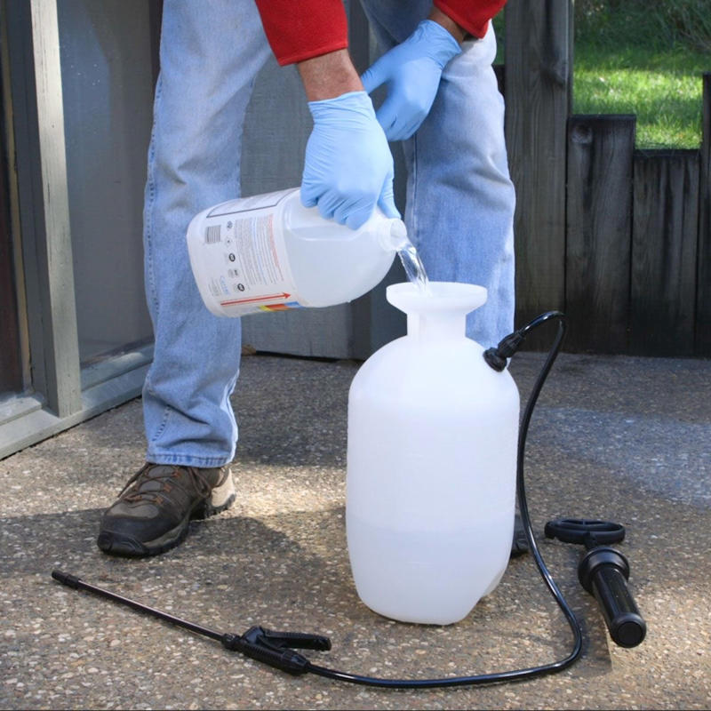 Power Wash the Slab, Load Up Pump Sprayer, dampening concrete, scrubbing concrete with stiff brush, soaking grass
