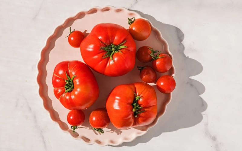 The health benefits of tomatoes, 1. Help prevent heart disease, 2. Support skin health, 3. Boost brain health, 4. May help reduce cancer risk, The healthiest ways to eat tomatoes, ranked by Rob Hobson, Tinned tomatoes, Tomatoes cooked from fresh, Tomato paste, Fresh tomatoes, Sun-dried tomatoes, Tomato juice, Tomato soup, Which type of tomato is healthiest?, Are tomatoes healthier when cooked?, Verdict: Are tomatoes good for you?