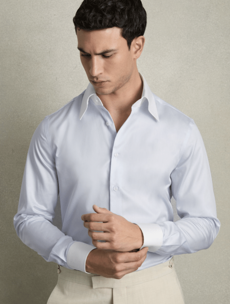 What is Cocktail Attire for Men, Exactly?, When Do You Wear Cocktail Attire?, How to Dress for Cocktail Attire: The Core Elements, Seasonal Cocktail Attire for Men, Cocktail Attire for Specific Occasions, The Best Men’s Suit Brands for Cocktail Attire, Frequently Asked Questions About Cocktail Attire