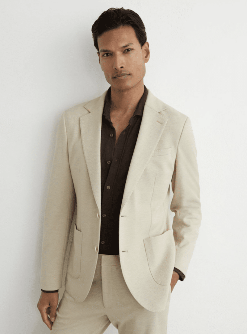 What is Cocktail Attire for Men, Exactly?, When Do You Wear Cocktail Attire?, How to Dress for Cocktail Attire: The Core Elements, Seasonal Cocktail Attire for Men, Cocktail Attire for Specific Occasions, The Best Men’s Suit Brands for Cocktail Attire, Frequently Asked Questions About Cocktail Attire