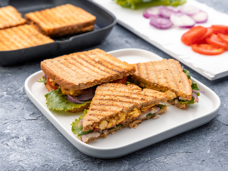 Paneer Sandwich Moong Dal Chilla With Paneer, Greek Yogurt With Nuts And Fruits, Boiled Eggs With Whole Wheat Toast, Oats Upma With Peanuts, Paneer Sandwich, Sprouts Salad Bowl, Peanut Butter Banana Smoothie