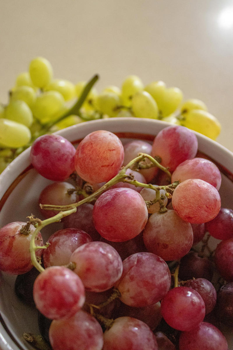Grapes: Grapes can carry excessive pesticide residues or artificial shine. Soak grapes in water with a little baking soda, then rinse well.