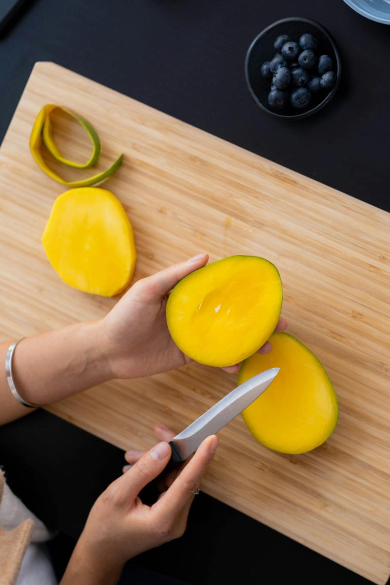 Mango: Mangoes are frequently ripened artificially using chemicals such as calcium carbide, which can leave toxic residues. Soak mangoes in water for 30 minutes before eating and choose fruits with a naturally sweet smell.