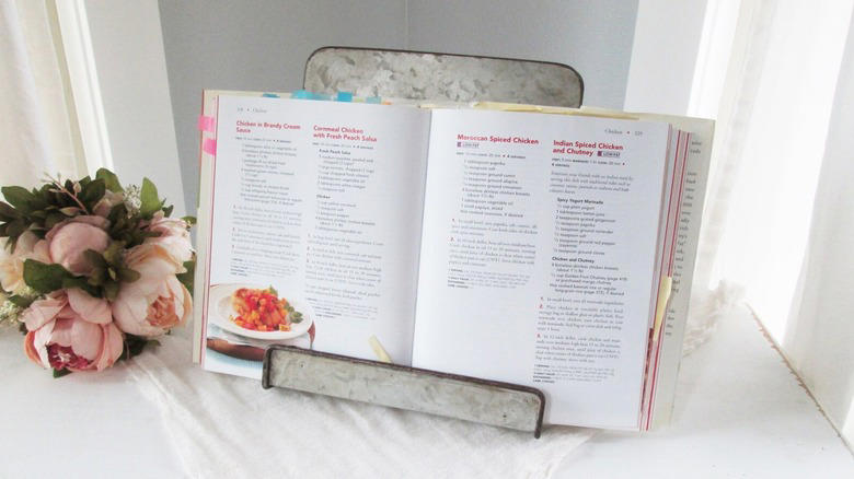 A decorative decoupage bowl, Hanging a decorated old frying pan, A tiny portable fire pit, Baking pan candle sconces, A vertical frying pan planter, Bundt cake pan planter, Sheet pan cookbook stand, Pizza pan wreath or sign