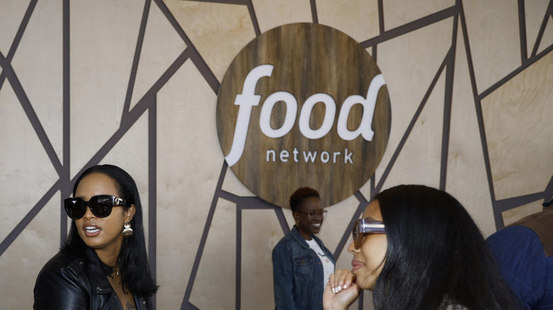1. Restaurants had to bear the cost of a visit, 2. Fieri was accused of making sexist and homophobic remarks, 3. A Diners, Drive-Ins and Dives producer sued Food Network, 4. Fieri wasn't able to hide when he didn't like something, 5. Many featured restaurants closed after the show's visit, 6. Fieri faced numerous lawsuits himself, 7. Fieri physically fought with his hairdresser, 8. Fieri famously feuded with Anthony Bourdain