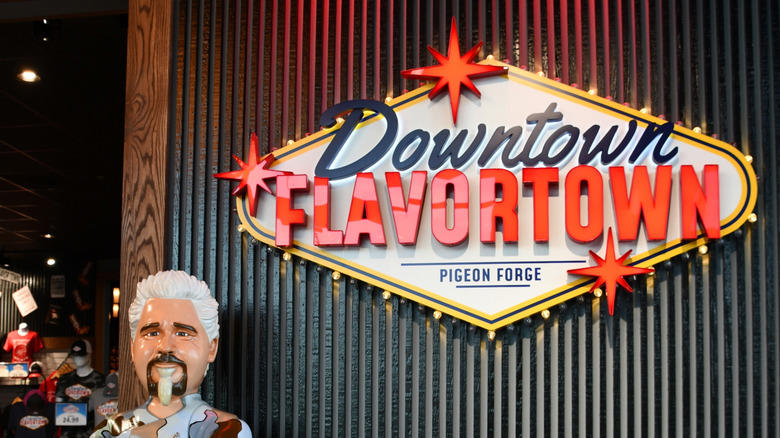 1. Restaurants had to bear the cost of a visit, 2. Fieri was accused of making sexist and homophobic remarks, 3. A Diners, Drive-Ins and Dives producer sued Food Network, 4. Fieri wasn't able to hide when he didn't like something, 5. Many featured restaurants closed after the show's visit, 6. Fieri faced numerous lawsuits himself, 7. Fieri physically fought with his hairdresser, 8. Fieri famously feuded with Anthony Bourdain