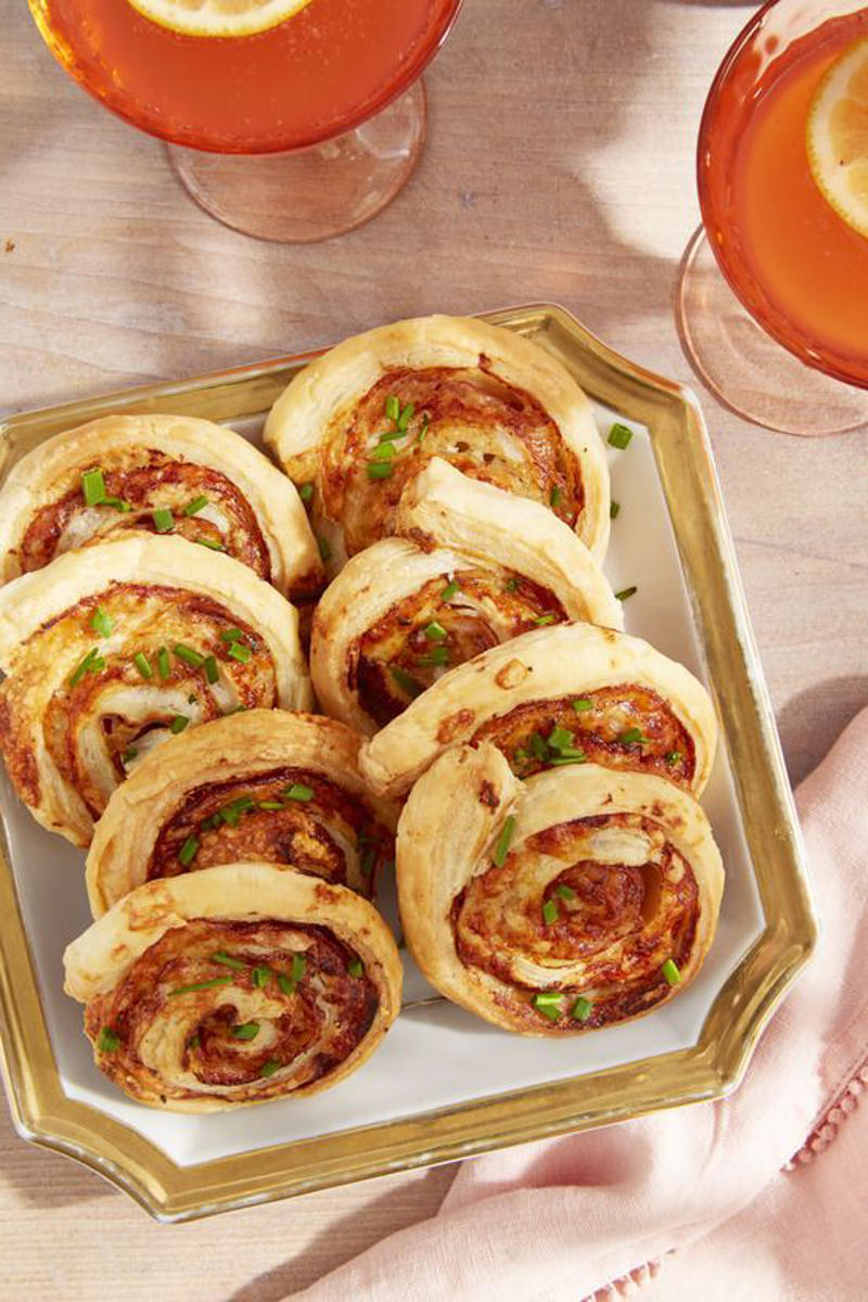 Bacon-Wrapped Stuffed Peppadews, Cheddar Holly Crackers, Christmas Tree Deviled Eggs, Honey-Apple Baked Brie with Fried Sage, Sharp Cheddar Sausage Balls , Warm Crab Dip