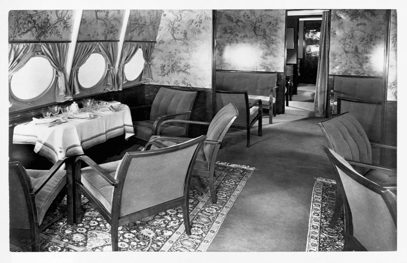 1920s: the Dornier Do X dining salon A flight back in time, 1920s: the beginnings of air travel, 1920s: a passenger compartment from the 1920s, 1920s: inside a Transcontinental Air Transport plane, 1920s: bed compartments of a German Junker aircraft, 1920s: a flight attendant serves drinks on a French Airliner service, 1920s: an early German Deutsche Luft Hansa plane, 1920s: the Dornier Do X dining salon, 1920s: the first ever in-flight movie, 1920s: enjoying breakfast at 3,000 feet (914m), 1920s: passengers get weighed before their flight, 1930s: passengers climb aboard a plane at Croydon Airport, England, 1930s: crew members check bags before a flight to LA, 1930s: the check-in desk at newly opened Gatwick Airport, 1930s: an early plane with wicker seats, 1930s: the comfortable seats of a Handley Page HP42, 1930s: a plush Imperial Airways cabin, 1930s: passengers aboard the Douglas DC-1, 1930s: a flight attendant serves tea in bed, 1930s: ladies traveling on an Eastern Air Transport plane, 1930s: chefs load up a plane with homemade treats, 1930s: women in their finest attire wait to board a plane, 1930s: passengers listen to a broadcast aboard a flight, Early 1940s: passengers on board the Junkers G.38 plane, 1940s: day cabins inside an Imperial Airways flying boat, 1940s: interior of a McDonnell Douglas DC-6, 1940s: inside a Sikorsky S-40 flying boat, Late 1930s: the early days of Pan Am, 1940s: Pan American Airlines' Boeing 314 Clipper sets off, 1940s: inside the Boeing 314 flying boat, 1940s: it wasn't cheap to fly aboard the Boeing 314, 1940s: a couple enjoys dinner aboard the Boeing 314, 1940s: the early days of Heathrow Airport, 1940s: Boeing 307 Stratoliner's cocktail lounge, 1940s: the overnight intercontinental service onboard Boeing Stratocruiser, 1940s: the communal lounge aboard a Boeing aeroplane, 1950s: guests relax in an onboard lounge compartment, 1950s: the Sky-Cot aboard a British Overseas Airways Corporation flight, 1950s: a movie projector on a United Airlines flight