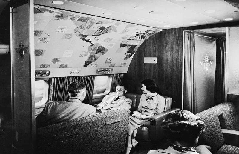 1950s: guests relax in an onboard lounge compartment A flight back in time, 1920s: the beginnings of air travel, 1920s: a passenger compartment from the 1920s, 1920s: inside a Transcontinental Air Transport plane, 1920s: bed compartments of a German Junker aircraft, 1920s: a flight attendant serves drinks on a French Airliner service, 1920s: an early German Deutsche Luft Hansa plane, 1920s: the Dornier Do X dining salon, 1920s: the first ever in-flight movie, 1920s: enjoying breakfast at 3,000 feet (914m), 1920s: passengers get weighed before their flight, 1930s: passengers climb aboard a plane at Croydon Airport, England, 1930s: crew members check bags before a flight to LA, 1930s: the check-in desk at newly opened Gatwick Airport, 1930s: an early plane with wicker seats, 1930s: the comfortable seats of a Handley Page HP42, 1930s: a plush Imperial Airways cabin, 1930s: passengers aboard the Douglas DC-1, 1930s: a flight attendant serves tea in bed, 1930s: ladies traveling on an Eastern Air Transport plane, 1930s: chefs load up a plane with homemade treats, 1930s: women in their finest attire wait to board a plane, 1930s: passengers listen to a broadcast aboard a flight, Early 1940s: passengers on board the Junkers G.38 plane, 1940s: day cabins inside an Imperial Airways flying boat, 1940s: interior of a McDonnell Douglas DC-6, 1940s: inside a Sikorsky S-40 flying boat, Late 1930s: the early days of Pan Am, 1940s: Pan American Airlines' Boeing 314 Clipper sets off, 1940s: inside the Boeing 314 flying boat, 1940s: it wasn't cheap to fly aboard the Boeing 314, 1940s: a couple enjoys dinner aboard the Boeing 314, 1940s: the early days of Heathrow Airport, 1940s: Boeing 307 Stratoliner's cocktail lounge, 1940s: the overnight intercontinental service onboard Boeing Stratocruiser, 1940s: the communal lounge aboard a Boeing aeroplane, 1950s: guests relax in an onboard lounge compartment, 1950s: the Sky-Cot aboard a British Overseas Airways Corporation flight, 1950s: a movie projector on a United Airlines flight