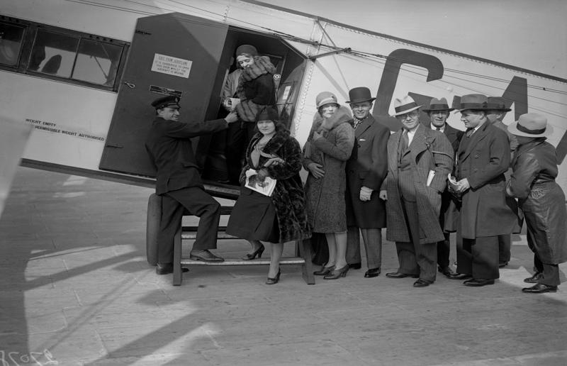 1930s: passengers climb aboard a plane at Croydon Airport, England A flight back in time, 1920s: the beginnings of air travel, 1920s: a passenger compartment from the 1920s, 1920s: inside a Transcontinental Air Transport plane, 1920s: bed compartments of a German Junker aircraft, 1920s: a flight attendant serves drinks on a French Airliner service, 1920s: an early German Deutsche Luft Hansa plane, 1920s: the Dornier Do X dining salon, 1920s: the first ever in-flight movie, 1920s: enjoying breakfast at 3,000 feet (914m), 1920s: passengers get weighed before their flight, 1930s: passengers climb aboard a plane at Croydon Airport, England, 1930s: crew members check bags before a flight to LA, 1930s: the check-in desk at newly opened Gatwick Airport, 1930s: an early plane with wicker seats, 1930s: the comfortable seats of a Handley Page HP42, 1930s: a plush Imperial Airways cabin, 1930s: passengers aboard the Douglas DC-1, 1930s: a flight attendant serves tea in bed, 1930s: ladies traveling on an Eastern Air Transport plane, 1930s: chefs load up a plane with homemade treats, 1930s: women in their finest attire wait to board a plane, 1930s: passengers listen to a broadcast aboard a flight, Early 1940s: passengers on board the Junkers G.38 plane, 1940s: day cabins inside an Imperial Airways flying boat, 1940s: interior of a McDonnell Douglas DC-6, 1940s: inside a Sikorsky S-40 flying boat, Late 1930s: the early days of Pan Am, 1940s: Pan American Airlines' Boeing 314 Clipper sets off, 1940s: inside the Boeing 314 flying boat, 1940s: it wasn't cheap to fly aboard the Boeing 314, 1940s: a couple enjoys dinner aboard the Boeing 314, 1940s: the early days of Heathrow Airport, 1940s: Boeing 307 Stratoliner's cocktail lounge, 1940s: the overnight intercontinental service onboard Boeing Stratocruiser, 1940s: the communal lounge aboard a Boeing aeroplane, 1950s: guests relax in an onboard lounge compartment, 1950s: the Sky-Cot aboard a British Overseas Airways Corporation flight, 1950s: a movie projector on a United Airlines flight