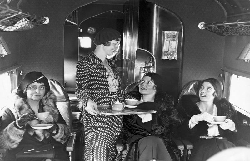 1930s: ladies traveling on an Eastern Air Transport plane A flight back in time, 1920s: the beginnings of air travel, 1920s: a passenger compartment from the 1920s, 1920s: inside a Transcontinental Air Transport plane, 1920s: bed compartments of a German Junker aircraft, 1920s: a flight attendant serves drinks on a French Airliner service, 1920s: an early German Deutsche Luft Hansa plane, 1920s: the Dornier Do X dining salon, 1920s: the first ever in-flight movie, 1920s: enjoying breakfast at 3,000 feet (914m), 1920s: passengers get weighed before their flight, 1930s: passengers climb aboard a plane at Croydon Airport, England, 1930s: crew members check bags before a flight to LA, 1930s: the check-in desk at newly opened Gatwick Airport, 1930s: an early plane with wicker seats, 1930s: the comfortable seats of a Handley Page HP42, 1930s: a plush Imperial Airways cabin, 1930s: passengers aboard the Douglas DC-1, 1930s: a flight attendant serves tea in bed, 1930s: ladies traveling on an Eastern Air Transport plane, 1930s: chefs load up a plane with homemade treats, 1930s: women in their finest attire wait to board a plane, 1930s: passengers listen to a broadcast aboard a flight, Early 1940s: passengers on board the Junkers G.38 plane, 1940s: day cabins inside an Imperial Airways flying boat, 1940s: interior of a McDonnell Douglas DC-6, 1940s: inside a Sikorsky S-40 flying boat, Late 1930s: the early days of Pan Am, 1940s: Pan American Airlines' Boeing 314 Clipper sets off, 1940s: inside the Boeing 314 flying boat, 1940s: it wasn't cheap to fly aboard the Boeing 314, 1940s: a couple enjoys dinner aboard the Boeing 314, 1940s: the early days of Heathrow Airport, 1940s: Boeing 307 Stratoliner's cocktail lounge, 1940s: the overnight intercontinental service onboard Boeing Stratocruiser, 1940s: the communal lounge aboard a Boeing aeroplane, 1950s: guests relax in an onboard lounge compartment, 1950s: the Sky-Cot aboard a British Overseas Airways Corporation flight, 1950s: a movie projector on a United Airlines flight