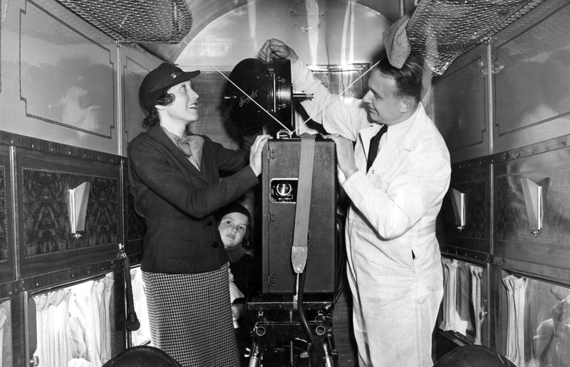 1950s: a movie projector on a United Airlines flight A flight back in time, 1920s: the beginnings of air travel, 1920s: a passenger compartment from the 1920s, 1920s: inside a Transcontinental Air Transport plane, 1920s: bed compartments of a German Junker aircraft, 1920s: a flight attendant serves drinks on a French Airliner service, 1920s: an early German Deutsche Luft Hansa plane, 1920s: the Dornier Do X dining salon, 1920s: the first ever in-flight movie, 1920s: enjoying breakfast at 3,000 feet (914m), 1920s: passengers get weighed before their flight, 1930s: passengers climb aboard a plane at Croydon Airport, England, 1930s: crew members check bags before a flight to LA, 1930s: the check-in desk at newly opened Gatwick Airport, 1930s: an early plane with wicker seats, 1930s: the comfortable seats of a Handley Page HP42, 1930s: a plush Imperial Airways cabin, 1930s: passengers aboard the Douglas DC-1, 1930s: a flight attendant serves tea in bed, 1930s: ladies traveling on an Eastern Air Transport plane, 1930s: chefs load up a plane with homemade treats, 1930s: women in their finest attire wait to board a plane, 1930s: passengers listen to a broadcast aboard a flight, Early 1940s: passengers on board the Junkers G.38 plane, 1940s: day cabins inside an Imperial Airways flying boat, 1940s: interior of a McDonnell Douglas DC-6, 1940s: inside a Sikorsky S-40 flying boat, Late 1930s: the early days of Pan Am, 1940s: Pan American Airlines' Boeing 314 Clipper sets off, 1940s: inside the Boeing 314 flying boat, 1940s: it wasn't cheap to fly aboard the Boeing 314, 1940s: a couple enjoys dinner aboard the Boeing 314, 1940s: the early days of Heathrow Airport, 1940s: Boeing 307 Stratoliner's cocktail lounge, 1940s: the overnight intercontinental service onboard Boeing Stratocruiser, 1940s: the communal lounge aboard a Boeing aeroplane, 1950s: guests relax in an onboard lounge compartment, 1950s: the Sky-Cot aboard a British Overseas Airways Corporation flight, 1950s: a movie projector on a United Airlines flight