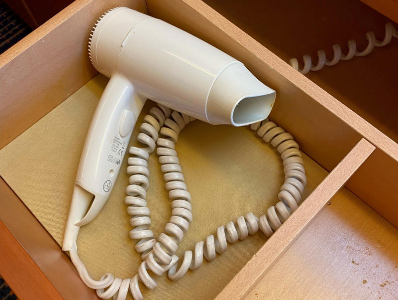 Leave the blow dryer at home. A small portable fan can be a lifesaver at night., It's helpful to bring a lanyard for your room key., It's helpful to have some cash with you., On the other hand, I never pack my own towels., Leave the blow dryer at home.