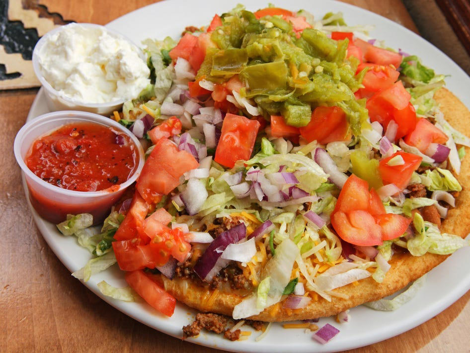 ARIZONA: Frybread tacos ALABAMA: A chicken sandwich with white barbecue sauce, ALASKA: A wild Alaskan salmon sandwich, ARIZONA: Frybread tacos, ARKANSAS: A deep-fried catfish sandwich, CALIFORNIA: An avocado club sandwich, COLORADO: A Denver sandwich, CONNECTICUT: A Connecticut hamburger, DELAWARE: A soft-shell fried crab sandwich, FLORIDA: A Cuban sandwich, GEORGIA: A fried chicken sandwich, HAWAII: A Kālua-style pork sandwich, ILLINOIS: A Horseshoe sandwich, INDIANA: A Hoosier sandwich, IOWA: A Tavern or "loose meat" sandwich, KANSAS: "Runza" or "bierocks", KENTUCKY: A Hot Brown sandwich, LOUISIANA: A po'boy, MARYLAND: A crab-cake sandwich, MASSACHUSETTS: A Fluffernutter, MICHIGAN: A corned beef sandwich, MINNESOTA: A Jucy Lucy, MISSISSIPPI: A pig-ear sandwich, MISSOURI: A Gerber sandwich, MONTANA: A PB&J with huckleberry jam, NEBRASKA: A Reuben, NEVADA: A Heart Attack Grill burger, NEW HAMPSHIRE: A fried ham and cheese Monte Cristo drizzled with syrup, NEW JERSEY: A Jersey breakfast sandwich, NEW MEXICO: A green chile cheeseburger, NORTH CAROLINA: A pulled-pork sandwich, NORTH DAKOTA: Smørbrød, OHIO: A Polish boy, OKLAHOMA: A chicken-fried steak sandwich, OREGON: A falafel pita, PENNSYLVANIA: A Philly cheesesteak, RHODE ISLAND: A Dynamite sandwich, SOUTH CAROLINA: A tuna melt, SOUTH DAKOTA: A walleye sandwich, TENNESSEE: A Fluffernutter, TEXAS: A brisket sandwich, UTAH: A pastrami burger, VERMONT: A Vermonter, VIRGINIA: A grilled ham and cheese, WASHINGTON: Bánh mì, WEST VIRGINIA: An apple and turkey sandwich, WISCONSIN: A sausage roll or brat bun, WYOMING: A bison meatball sandwich