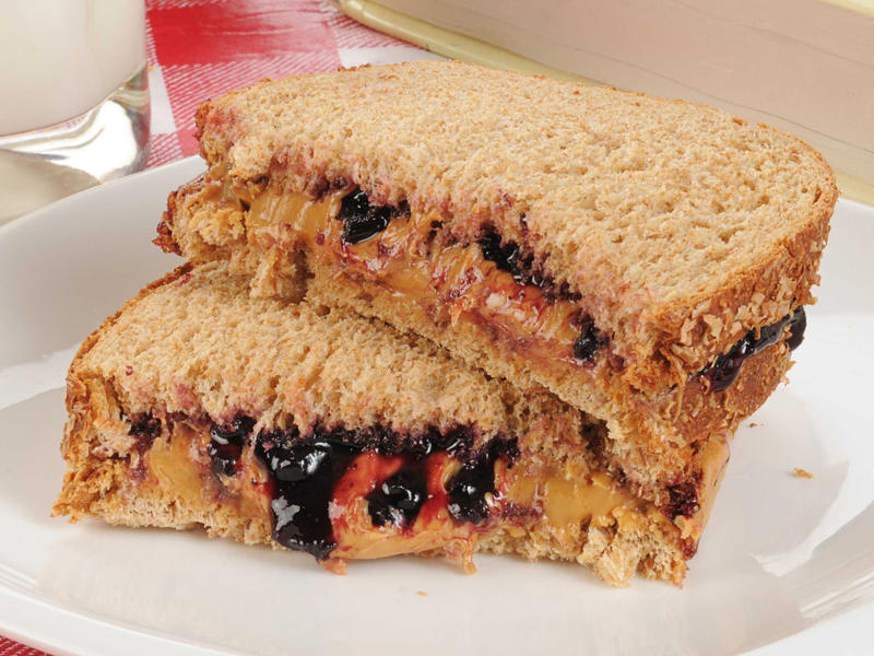 MONTANA: A PB&J with huckleberry jam ALABAMA: A chicken sandwich with white barbecue sauce, ALASKA: A wild Alaskan salmon sandwich, ARIZONA: Frybread tacos, ARKANSAS: A deep-fried catfish sandwich, CALIFORNIA: An avocado club sandwich, COLORADO: A Denver sandwich, CONNECTICUT: A Connecticut hamburger, DELAWARE: A soft-shell fried crab sandwich, FLORIDA: A Cuban sandwich, GEORGIA: A fried chicken sandwich, HAWAII: A Kālua-style pork sandwich, ILLINOIS: A Horseshoe sandwich, INDIANA: A Hoosier sandwich, IOWA: A Tavern or "loose meat" sandwich, KANSAS: "Runza" or "bierocks", KENTUCKY: A Hot Brown sandwich, LOUISIANA: A po'boy, MARYLAND: A crab-cake sandwich, MASSACHUSETTS: A Fluffernutter, MICHIGAN: A corned beef sandwich, MINNESOTA: A Jucy Lucy, MISSISSIPPI: A pig-ear sandwich, MISSOURI: A Gerber sandwich, MONTANA: A PB&J with huckleberry jam, NEBRASKA: A Reuben, NEVADA: A Heart Attack Grill burger, NEW HAMPSHIRE: A fried ham and cheese Monte Cristo drizzled with syrup, NEW JERSEY: A Jersey breakfast sandwich, NEW MEXICO: A green chile cheeseburger, NORTH CAROLINA: A pulled-pork sandwich, NORTH DAKOTA: Smørbrød, OHIO: A Polish boy, OKLAHOMA: A chicken-fried steak sandwich, OREGON: A falafel pita, PENNSYLVANIA: A Philly cheesesteak, RHODE ISLAND: A Dynamite sandwich, SOUTH CAROLINA: A tuna melt, SOUTH DAKOTA: A walleye sandwich, TENNESSEE: A Fluffernutter, TEXAS: A brisket sandwich, UTAH: A pastrami burger, VERMONT: A Vermonter, VIRGINIA: A grilled ham and cheese, WASHINGTON: Bánh mì, WEST VIRGINIA: An apple and turkey sandwich, WISCONSIN: A sausage roll or brat bun, WYOMING: A bison meatball sandwich