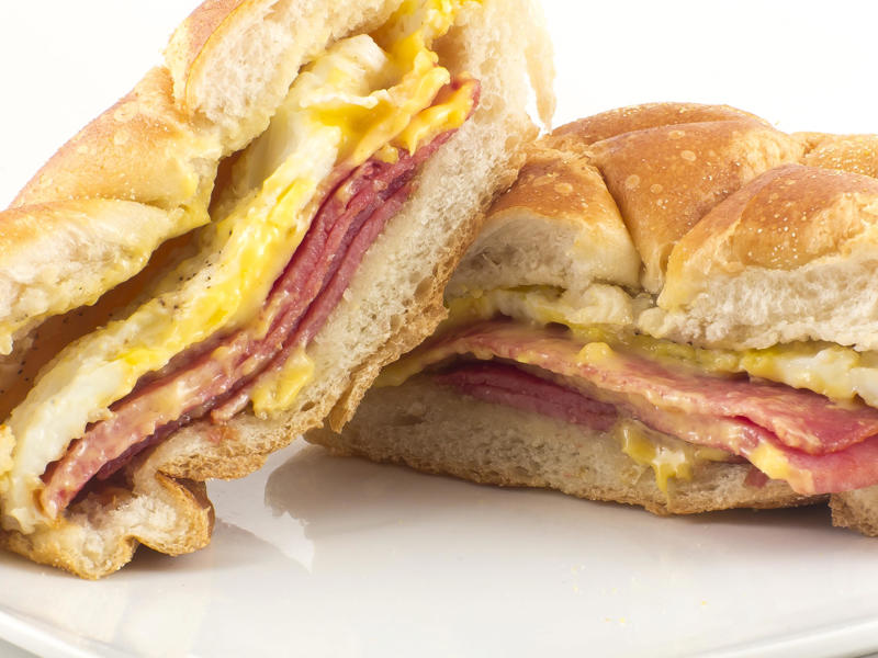 NEW JERSEY: A Jersey breakfast sandwich ALABAMA: A chicken sandwich with white barbecue sauce, ALASKA: A wild Alaskan salmon sandwich, ARIZONA: Frybread tacos, ARKANSAS: A deep-fried catfish sandwich, CALIFORNIA: An avocado club sandwich, COLORADO: A Denver sandwich, CONNECTICUT: A Connecticut hamburger, DELAWARE: A soft-shell fried crab sandwich, FLORIDA: A Cuban sandwich, GEORGIA: A fried chicken sandwich, HAWAII: A Kālua-style pork sandwich, ILLINOIS: A Horseshoe sandwich, INDIANA: A Hoosier sandwich, IOWA: A Tavern or "loose meat" sandwich, KANSAS: "Runza" or "bierocks", KENTUCKY: A Hot Brown sandwich, LOUISIANA: A po'boy, MARYLAND: A crab-cake sandwich, MASSACHUSETTS: A Fluffernutter, MICHIGAN: A corned beef sandwich, MINNESOTA: A Jucy Lucy, MISSISSIPPI: A pig-ear sandwich, MISSOURI: A Gerber sandwich, MONTANA: A PB&J with huckleberry jam, NEBRASKA: A Reuben, NEVADA: A Heart Attack Grill burger, NEW HAMPSHIRE: A fried ham and cheese Monte Cristo drizzled with syrup, NEW JERSEY: A Jersey breakfast sandwich, NEW MEXICO: A green chile cheeseburger, NORTH CAROLINA: A pulled-pork sandwich, NORTH DAKOTA: Smørbrød, OHIO: A Polish boy, OKLAHOMA: A chicken-fried steak sandwich, OREGON: A falafel pita, PENNSYLVANIA: A Philly cheesesteak, RHODE ISLAND: A Dynamite sandwich, SOUTH CAROLINA: A tuna melt, SOUTH DAKOTA: A walleye sandwich, TENNESSEE: A Fluffernutter, TEXAS: A brisket sandwich, UTAH: A pastrami burger, VERMONT: A Vermonter, VIRGINIA: A grilled ham and cheese, WASHINGTON: Bánh mì, WEST VIRGINIA: An apple and turkey sandwich, WISCONSIN: A sausage roll or brat bun, WYOMING: A bison meatball sandwich