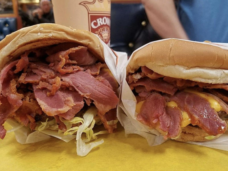 UTAH: A pastrami burger ALABAMA: A chicken sandwich with white barbecue sauce, ALASKA: A wild Alaskan salmon sandwich, ARIZONA: Frybread tacos, ARKANSAS: A deep-fried catfish sandwich, CALIFORNIA: An avocado club sandwich, COLORADO: A Denver sandwich, CONNECTICUT: A Connecticut hamburger, DELAWARE: A soft-shell fried crab sandwich, FLORIDA: A Cuban sandwich, GEORGIA: A fried chicken sandwich, HAWAII: A Kālua-style pork sandwich, ILLINOIS: A Horseshoe sandwich, INDIANA: A Hoosier sandwich, IOWA: A Tavern or "loose meat" sandwich, KANSAS: "Runza" or "bierocks", KENTUCKY: A Hot Brown sandwich, LOUISIANA: A po'boy, MARYLAND: A crab-cake sandwich, MASSACHUSETTS: A Fluffernutter, MICHIGAN: A corned beef sandwich, MINNESOTA: A Jucy Lucy, MISSISSIPPI: A pig-ear sandwich, MISSOURI: A Gerber sandwich, MONTANA: A PB&J with huckleberry jam, NEBRASKA: A Reuben, NEVADA: A Heart Attack Grill burger, NEW HAMPSHIRE: A fried ham and cheese Monte Cristo drizzled with syrup, NEW JERSEY: A Jersey breakfast sandwich, NEW MEXICO: A green chile cheeseburger, NORTH CAROLINA: A pulled-pork sandwich, NORTH DAKOTA: Smørbrød, OHIO: A Polish boy, OKLAHOMA: A chicken-fried steak sandwich, OREGON: A falafel pita, PENNSYLVANIA: A Philly cheesesteak, RHODE ISLAND: A Dynamite sandwich, SOUTH CAROLINA: A tuna melt, SOUTH DAKOTA: A walleye sandwich, TENNESSEE: A Fluffernutter, TEXAS: A brisket sandwich, UTAH: A pastrami burger, VERMONT: A Vermonter, VIRGINIA: A grilled ham and cheese, WASHINGTON: Bánh mì, WEST VIRGINIA: An apple and turkey sandwich, WISCONSIN: A sausage roll or brat bun, WYOMING: A bison meatball sandwich