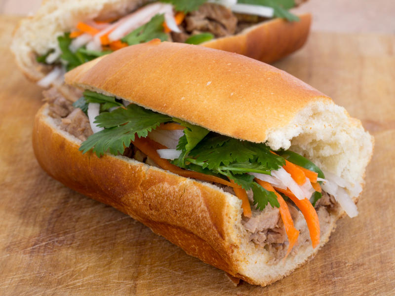 WASHINGTON: Bánh mì ALABAMA: A chicken sandwich with white barbecue sauce, ALASKA: A wild Alaskan salmon sandwich, ARIZONA: Frybread tacos, ARKANSAS: A deep-fried catfish sandwich, CALIFORNIA: An avocado club sandwich, COLORADO: A Denver sandwich, CONNECTICUT: A Connecticut hamburger, DELAWARE: A soft-shell fried crab sandwich, FLORIDA: A Cuban sandwich, GEORGIA: A fried chicken sandwich, HAWAII: A Kālua-style pork sandwich, ILLINOIS: A Horseshoe sandwich, INDIANA: A Hoosier sandwich, IOWA: A Tavern or "loose meat" sandwich, KANSAS: "Runza" or "bierocks", KENTUCKY: A Hot Brown sandwich, LOUISIANA: A po'boy, MARYLAND: A crab-cake sandwich, MASSACHUSETTS: A Fluffernutter, MICHIGAN: A corned beef sandwich, MINNESOTA: A Jucy Lucy, MISSISSIPPI: A pig-ear sandwich, MISSOURI: A Gerber sandwich, MONTANA: A PB&J with huckleberry jam, NEBRASKA: A Reuben, NEVADA: A Heart Attack Grill burger, NEW HAMPSHIRE: A fried ham and cheese Monte Cristo drizzled with syrup, NEW JERSEY: A Jersey breakfast sandwich, NEW MEXICO: A green chile cheeseburger, NORTH CAROLINA: A pulled-pork sandwich, NORTH DAKOTA: Smørbrød, OHIO: A Polish boy, OKLAHOMA: A chicken-fried steak sandwich, OREGON: A falafel pita, PENNSYLVANIA: A Philly cheesesteak, RHODE ISLAND: A Dynamite sandwich, SOUTH CAROLINA: A tuna melt, SOUTH DAKOTA: A walleye sandwich, TENNESSEE: A Fluffernutter, TEXAS: A brisket sandwich, UTAH: A pastrami burger, VERMONT: A Vermonter, VIRGINIA: A grilled ham and cheese, WASHINGTON: Bánh mì, WEST VIRGINIA: An apple and turkey sandwich, WISCONSIN: A sausage roll or brat bun, WYOMING: A bison meatball sandwich