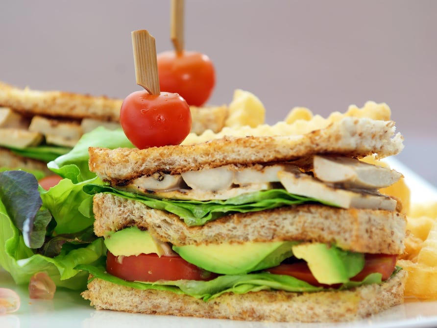 CALIFORNIA: An avocado club sandwich ALABAMA: A chicken sandwich with white barbecue sauce, ALASKA: A wild Alaskan salmon sandwich, ARIZONA: Frybread tacos, ARKANSAS: A deep-fried catfish sandwich, CALIFORNIA: An avocado club sandwich, COLORADO: A Denver sandwich, CONNECTICUT: A Connecticut hamburger, DELAWARE: A soft-shell fried crab sandwich, FLORIDA: A Cuban sandwich, GEORGIA: A fried chicken sandwich, HAWAII: A Kālua-style pork sandwich, ILLINOIS: A Horseshoe sandwich, INDIANA: A Hoosier sandwich, IOWA: A Tavern or "loose meat" sandwich, KANSAS: "Runza" or "bierocks", KENTUCKY: A Hot Brown sandwich, LOUISIANA: A po'boy, MARYLAND: A crab-cake sandwich, MASSACHUSETTS: A Fluffernutter, MICHIGAN: A corned beef sandwich, MINNESOTA: A Jucy Lucy, MISSISSIPPI: A pig-ear sandwich, MISSOURI: A Gerber sandwich, MONTANA: A PB&J with huckleberry jam, NEBRASKA: A Reuben, NEVADA: A Heart Attack Grill burger, NEW HAMPSHIRE: A fried ham and cheese Monte Cristo drizzled with syrup, NEW JERSEY: A Jersey breakfast sandwich, NEW MEXICO: A green chile cheeseburger, NORTH CAROLINA: A pulled-pork sandwich, NORTH DAKOTA: Smørbrød, OHIO: A Polish boy, OKLAHOMA: A chicken-fried steak sandwich, OREGON: A falafel pita, PENNSYLVANIA: A Philly cheesesteak, RHODE ISLAND: A Dynamite sandwich, SOUTH CAROLINA: A tuna melt, SOUTH DAKOTA: A walleye sandwich, TENNESSEE: A Fluffernutter, TEXAS: A brisket sandwich, UTAH: A pastrami burger, VERMONT: A Vermonter, VIRGINIA: A grilled ham and cheese, WASHINGTON: Bánh mì, WEST VIRGINIA: An apple and turkey sandwich, WISCONSIN: A sausage roll or brat bun, WYOMING: A bison meatball sandwich