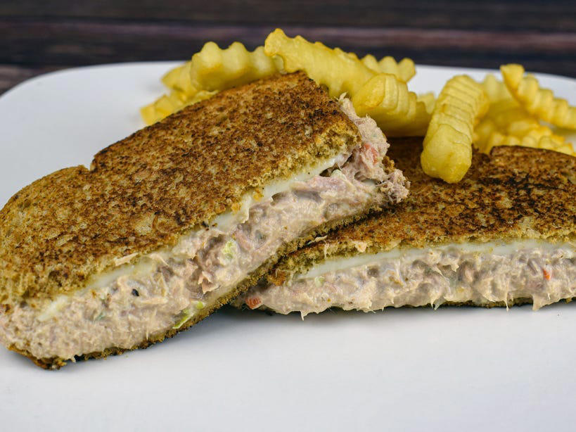 SOUTH CAROLINA: A tuna melt ALABAMA: A chicken sandwich with white barbecue sauce, ALASKA: A wild Alaskan salmon sandwich, ARIZONA: Frybread tacos, ARKANSAS: A deep-fried catfish sandwich, CALIFORNIA: An avocado club sandwich, COLORADO: A Denver sandwich, CONNECTICUT: A Connecticut hamburger, DELAWARE: A soft-shell fried crab sandwich, FLORIDA: A Cuban sandwich, GEORGIA: A fried chicken sandwich, HAWAII: A Kālua-style pork sandwich, ILLINOIS: A Horseshoe sandwich, INDIANA: A Hoosier sandwich, IOWA: A Tavern or "loose meat" sandwich, KANSAS: "Runza" or "bierocks", KENTUCKY: A Hot Brown sandwich, LOUISIANA: A po'boy, MARYLAND: A crab-cake sandwich, MASSACHUSETTS: A Fluffernutter, MICHIGAN: A corned beef sandwich, MINNESOTA: A Jucy Lucy, MISSISSIPPI: A pig-ear sandwich, MISSOURI: A Gerber sandwich, MONTANA: A PB&J with huckleberry jam, NEBRASKA: A Reuben, NEVADA: A Heart Attack Grill burger, NEW HAMPSHIRE: A fried ham and cheese Monte Cristo drizzled with syrup, NEW JERSEY: A Jersey breakfast sandwich, NEW MEXICO: A green chile cheeseburger, NORTH CAROLINA: A pulled-pork sandwich, NORTH DAKOTA: Smørbrød, OHIO: A Polish boy, OKLAHOMA: A chicken-fried steak sandwich, OREGON: A falafel pita, PENNSYLVANIA: A Philly cheesesteak, RHODE ISLAND: A Dynamite sandwich, SOUTH CAROLINA: A tuna melt, SOUTH DAKOTA: A walleye sandwich, TENNESSEE: A Fluffernutter, TEXAS: A brisket sandwich, UTAH: A pastrami burger, VERMONT: A Vermonter, VIRGINIA: A grilled ham and cheese, WASHINGTON: Bánh mì, WEST VIRGINIA: An apple and turkey sandwich, WISCONSIN: A sausage roll or brat bun, WYOMING: A bison meatball sandwich