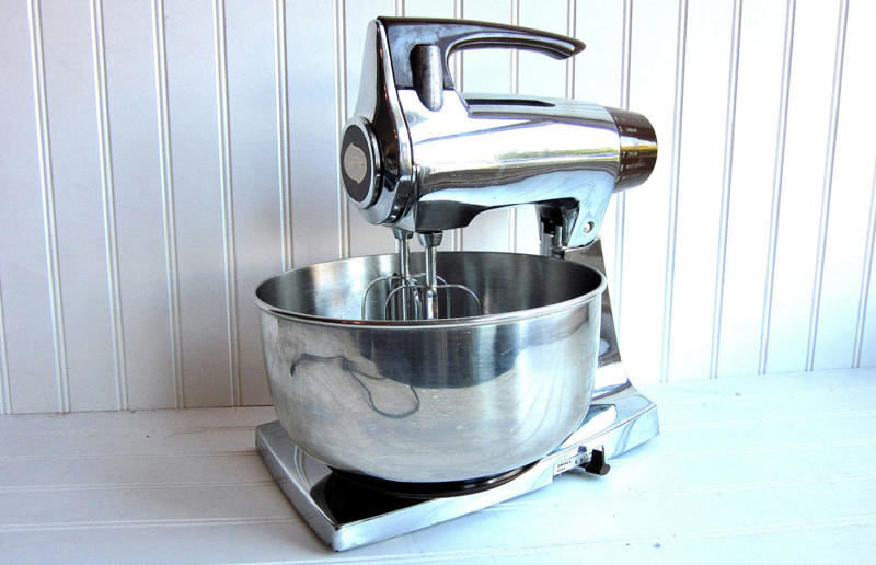 Sunbeam Mixmaster The most popular items from the decade, Braun T3, Yardley Oh! de London, Remington Lektronic, Sony Triniton KV-1210, Kodak Instamatic 104, Sunbeam Mixmaster, Pifco Princess, Black & Decker U-100, West Bend Flavo-matic, Chinese Girl by Vladimir Tretchikoff, Troll Dolls, Hoover Dial-A-Matic, Western Electric Model 500, Uncle Milton's Ant Farm, General Electric Automatic Toothbrush, Chatty Cathy, Etch-a-Sketch