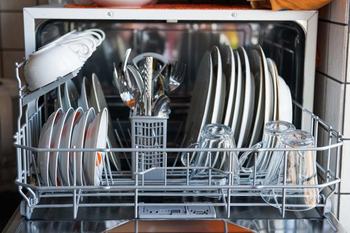 Not cleaning or overcleaning dishes before loading them, Abusing the door, Using too much detergent, Running small loads, Forgetting to replace the hose, Using hard water, Avoiding regular inspections, Putting sharp objects in the racks, Leaving broken glass in the bottom, Overloading it, Using the delay cycle, Forgetting to empty the food trap, Running through candle holders without removing melted wax, Putting in items that are too dirty, Skipping surge protectors, Not using a dishwasher cleaning product, Using cheap dishwasher products, Forgetting to lock the filter at the bottom of the dishwasher, Neglecting to clean the dishwasher screen, Running the wrong cycle type, Loading it incorrectly