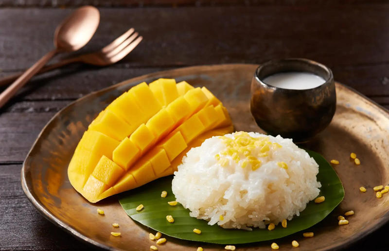 53. Sticky rice with mango, Thailand 61. Rigó Jancsi, Hungary, 60. Sorbet, various locations, 59. Sticky rice with mango, Thailand, 58. Ma’amoul, Egypt, 57. M’hanncha, Morocco, 56. Vermicelles, France, Italy and Switzerland, 55. Thapthim krop, Thailand, 54. S’mores, USA, 53. Dadar gulung, Indonesia, 52. Cannoli, Italy, 51. Crème caramel, France, 50. Rum cake, Caribbean, 49. Torrijas, Spain, 48. Malva pudding, South Africa, 47. Koeksister, South Africa, 46. Carlota de limón, Mexico, 45. Banoffee pie, England, UK, 44. Alfajores, South America, 43. Doughnuts, various locations, 42. Medovik, Russia, 41. Crumble, UK, 40. Lamington, Australia, 39. Bread and butter pudding, England, UK, 38. Profiteroles, France, 37. Galaktoboureko, various locations, 36. Gelato, Italy, 35. Churros, Spain and Portugal, 34. Gulab jamun, India, 33. Trifle, England, UK, 32. Snow ice, Taiwan, 31. Red velvet cake, USA, 30. Crêpes Suzette, France, 29. Bienenstich, Germany, 28. Chocolate soufflé, France, 27. Baked Alaska, USA, 26. Mooncakes, China, 25. Panna cotta, Italy, 24. Qatayef, Middle East, 23. Eton mess, England, UK, 22. Pecan pie, USA, 21. Pavlova, Australia or New Zealand, 20. Brownies, USA, 19. Rote grütze, Germany, 18. Tarte Tatin, France, 17. Kulfi, India, 16. Tiramisù, Italy, 15. Crème brûlée, France, 14. Frozen yogurt, USA, 13. Sticky toffee pudding, UK, 12. Black Forest gâteau, Germany, 11. Nanaimo bar, Canada, 10. Cendol, Southeast Asia, 9. Mochi, Japan, 8. Tres leches cake, Latin America, 7. Baklava, Türkiye, 6. Key lime pie, USA, 5. Chocolate mousse, France, 4. Apfelstrudel, Austria, 3. Apple pie, various locations, 2. Cheesecake, various locations