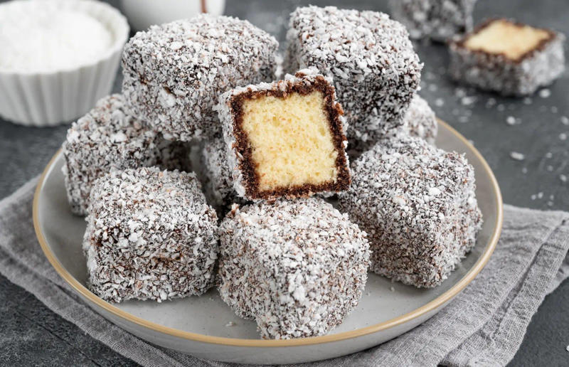 38. Lamington, Australia 61. Rigó Jancsi, Hungary, 60. Sorbet, various locations, 59. Sticky rice with mango, Thailand, 58. Ma’amoul, Egypt, 57. M’hanncha, Morocco, 56. Vermicelles, France, Italy and Switzerland, 55. Thapthim krop, Thailand, 54. S’mores, USA, 53. Dadar gulung, Indonesia, 52. Cannoli, Italy, 51. Crème caramel, France, 50. Rum cake, Caribbean, 49. Torrijas, Spain, 48. Malva pudding, South Africa, 47. Koeksister, South Africa, 46. Carlota de limón, Mexico, 45. Banoffee pie, England, UK, 44. Alfajores, South America, 43. Doughnuts, various locations, 42. Medovik, Russia, 41. Crumble, UK, 40. Lamington, Australia, 39. Bread and butter pudding, England, UK, 38. Profiteroles, France, 37. Galaktoboureko, various locations, 36. Gelato, Italy, 35. Churros, Spain and Portugal, 34. Gulab jamun, India, 33. Trifle, England, UK, 32. Snow ice, Taiwan, 31. Red velvet cake, USA, 30. Crêpes Suzette, France, 29. Bienenstich, Germany, 28. Chocolate soufflé, France, 27. Baked Alaska, USA, 26. Mooncakes, China, 25. Panna cotta, Italy, 24. Qatayef, Middle East, 23. Eton mess, England, UK, 22. Pecan pie, USA, 21. Pavlova, Australia or New Zealand, 20. Brownies, USA, 19. Rote grütze, Germany, 18. Tarte Tatin, France, 17. Kulfi, India, 16. Tiramisù, Italy, 15. Crème brûlée, France, 14. Frozen yogurt, USA, 13. Sticky toffee pudding, UK, 12. Black Forest gâteau, Germany, 11. Nanaimo bar, Canada, 10. Cendol, Southeast Asia, 9. Mochi, Japan, 8. Tres leches cake, Latin America, 7. Baklava, Türkiye, 6. Key lime pie, USA, 5. Chocolate mousse, France, 4. Apfelstrudel, Austria, 3. Apple pie, various locations, 2. Cheesecake, various locations