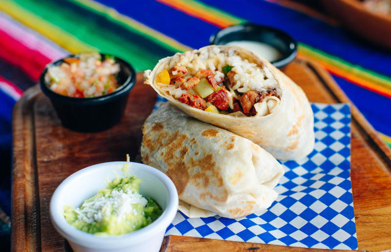 15. Burrito, Mexico or USA 36. Bitterballen, Netherlands, 35. Pierogi, Poland, 34. Choripán, Argentina, 33. Slider, USA, 32. Elote, Mexico, 31. Rolex, Uganda, 30. Pad Thai, Thailand, 29. Souvlaki, Greece, 28. Bhelpuri, India, 27. Bánh mì, Vietnam, 26. Ta’ameya, Egypt, 25. Chǎofàn, China, 24. Shawarma, Turkey, 23. Arepa, Venezuela and Colombia, 22. Vada pav, India, 21. Gyros, Greece, 20. Churros, Spain, 19. Bao buns, China, 18. Fish and chips, UK, 17. Takoyaki, Japan, 16. Currywurst, Germany, 15. Burrito, Mexico or USA, 14. Döner kebab, Germany, 13. Bunny chow, South Africa, 12. Tacos, Mexico, 11. Meat pie, Australia, 10. Bratwurst, Germany, 9. Samosa, India, 8. Poutine, Canada, 7. Cheeseburger, USA, 6. Fried chicken, various locations, 5. Hot dog, various locations, 4. Fried chicken sandwich, USA, 3. Pizza, Italy, 2. Hamburger, various locations