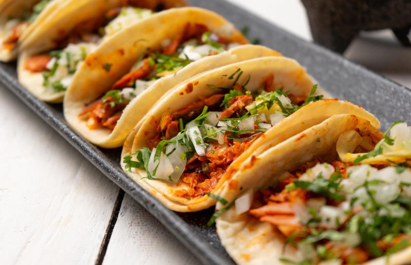 12. Tacos, Mexico 36. Bitterballen, Netherlands, 35. Pierogi, Poland, 34. Choripán, Argentina, 33. Slider, USA, 32. Elote, Mexico, 31. Rolex, Uganda, 30. Pad Thai, Thailand, 29. Souvlaki, Greece, 28. Bhelpuri, India, 27. Bánh mì, Vietnam, 26. Ta’ameya, Egypt, 25. Chǎofàn, China, 24. Shawarma, Turkey, 23. Arepa, Venezuela and Colombia, 22. Vada pav, India, 21. Gyros, Greece, 20. Churros, Spain, 19. Bao buns, China, 18. Fish and chips, UK, 17. Takoyaki, Japan, 16. Currywurst, Germany, 15. Burrito, Mexico or USA, 14. Döner kebab, Germany, 13. Bunny chow, South Africa, 12. Tacos, Mexico, 11. Meat pie, Australia, 10. Bratwurst, Germany, 9. Samosa, India, 8. Poutine, Canada, 7. Cheeseburger, USA, 6. Fried chicken, various locations, 5. Hot dog, various locations, 4. Fried chicken sandwich, USA, 3. Pizza, Italy, 2. Hamburger, various locations