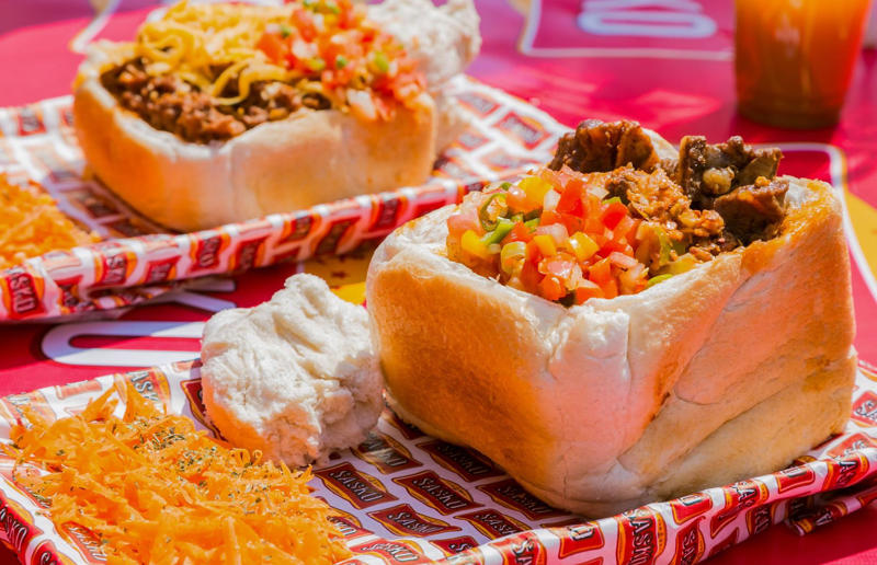 13. Bunny chow, South Africa 36. Bitterballen, Netherlands, 35. Pierogi, Poland, 34. Choripán, Argentina, 33. Slider, USA, 32. Elote, Mexico, 31. Rolex, Uganda, 30. Pad Thai, Thailand, 29. Souvlaki, Greece, 28. Bhelpuri, India, 27. Bánh mì, Vietnam, 26. Ta’ameya, Egypt, 25. Chǎofàn, China, 24. Shawarma, Turkey, 23. Arepa, Venezuela and Colombia, 22. Vada pav, India, 21. Gyros, Greece, 20. Churros, Spain, 19. Bao buns, China, 18. Fish and chips, UK, 17. Takoyaki, Japan, 16. Currywurst, Germany, 15. Burrito, Mexico or USA, 14. Döner kebab, Germany, 13. Bunny chow, South Africa, 12. Tacos, Mexico, 11. Meat pie, Australia, 10. Bratwurst, Germany, 9. Samosa, India, 8. Poutine, Canada, 7. Cheeseburger, USA, 6. Fried chicken, various locations, 5. Hot dog, various locations, 4. Fried chicken sandwich, USA, 3. Pizza, Italy, 2. Hamburger, various locations
