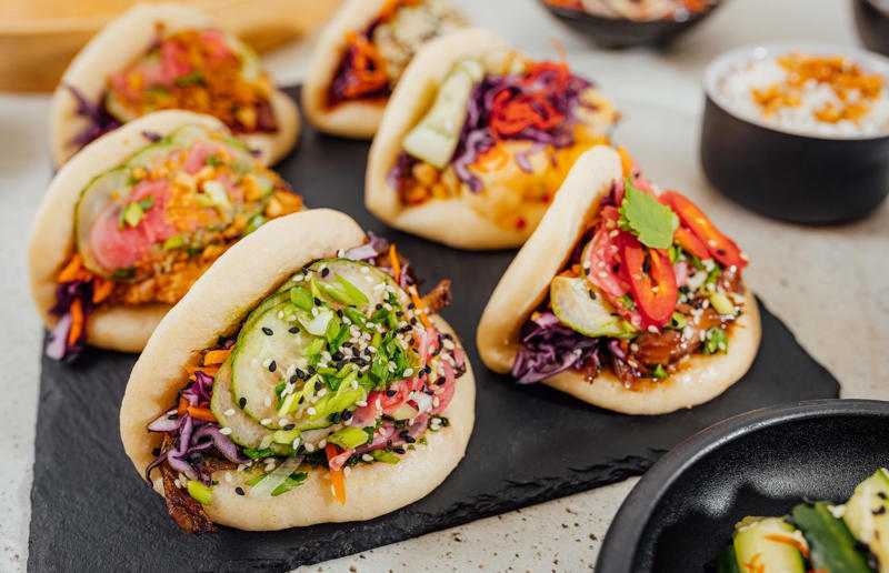 18. Bao buns, China 36. Bitterballen, Netherlands, 35. Pierogi, Poland, 34. Choripán, Argentina, 33. Slider, USA, 32. Elote, Mexico, 31. Rolex, Uganda, 30. Pad Thai, Thailand, 29. Souvlaki, Greece, 28. Bhelpuri, India, 27. Bánh mì, Vietnam, 26. Ta’ameya, Egypt, 25. Chǎofàn, China, 24. Shawarma, Turkey, 23. Arepa, Venezuela and Colombia, 22. Vada pav, India, 21. Gyros, Greece, 20. Churros, Spain, 19. Bao buns, China, 18. Fish and chips, UK, 17. Takoyaki, Japan, 16. Currywurst, Germany, 15. Burrito, Mexico or USA, 14. Döner kebab, Germany, 13. Bunny chow, South Africa, 12. Tacos, Mexico, 11. Meat pie, Australia, 10. Bratwurst, Germany, 9. Samosa, India, 8. Poutine, Canada, 7. Cheeseburger, USA, 6. Fried chicken, various locations, 5. Hot dog, various locations, 4. Fried chicken sandwich, USA, 3. Pizza, Italy, 2. Hamburger, various locations