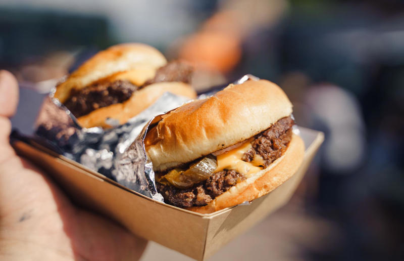 7. Cheeseburger, USA 36. Bitterballen, Netherlands, 35. Pierogi, Poland, 34. Choripán, Argentina, 33. Slider, USA, 32. Elote, Mexico, 31. Rolex, Uganda, 30. Pad Thai, Thailand, 29. Souvlaki, Greece, 28. Bhelpuri, India, 27. Bánh mì, Vietnam, 26. Ta’ameya, Egypt, 25. Chǎofàn, China, 24. Shawarma, Turkey, 23. Arepa, Venezuela and Colombia, 22. Vada pav, India, 21. Gyros, Greece, 20. Churros, Spain, 19. Bao buns, China, 18. Fish and chips, UK, 17. Takoyaki, Japan, 16. Currywurst, Germany, 15. Burrito, Mexico or USA, 14. Döner kebab, Germany, 13. Bunny chow, South Africa, 12. Tacos, Mexico, 11. Meat pie, Australia, 10. Bratwurst, Germany, 9. Samosa, India, 8. Poutine, Canada, 7. Cheeseburger, USA, 6. Fried chicken, various locations, 5. Hot dog, various locations, 4. Fried chicken sandwich, USA, 3. Pizza, Italy, 2. Hamburger, various locations