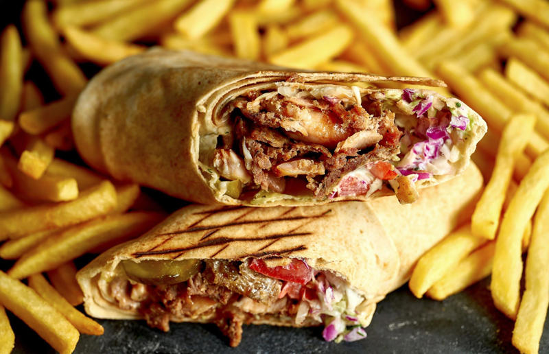 22. Shawarma, Turkey 36. Bitterballen, Netherlands, 35. Pierogi, Poland, 34. Choripán, Argentina, 33. Slider, USA, 32. Elote, Mexico, 31. Rolex, Uganda, 30. Pad Thai, Thailand, 29. Souvlaki, Greece, 28. Bhelpuri, India, 27. Bánh mì, Vietnam, 26. Ta’ameya, Egypt, 25. Chǎofàn, China, 24. Shawarma, Turkey, 23. Arepa, Venezuela and Colombia, 22. Vada pav, India, 21. Gyros, Greece, 20. Churros, Spain, 19. Bao buns, China, 18. Fish and chips, UK, 17. Takoyaki, Japan, 16. Currywurst, Germany, 15. Burrito, Mexico or USA, 14. Döner kebab, Germany, 13. Bunny chow, South Africa, 12. Tacos, Mexico, 11. Meat pie, Australia, 10. Bratwurst, Germany, 9. Samosa, India, 8. Poutine, Canada, 7. Cheeseburger, USA, 6. Fried chicken, various locations, 5. Hot dog, various locations, 4. Fried chicken sandwich, USA, 3. Pizza, Italy, 2. Hamburger, various locations