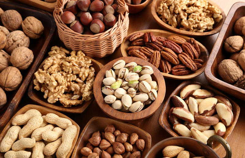 Eat: nuts 29. Eat more unrefined carbs, 28. Cook from scratch, 27. Replace saturated fat with monosaturated fat, 26. Drink green tea, 25. Try a Mediterranean diet, 24. Be a healthy vegan, 23. Only eat fries once a week, 22. Enjoy healthy sweet treats, 21. Toast bread until golden brown, 20. Don't char your meat too much, 19. Cut down on the hot dogs, 18. Choose nitrate-free bacon, 17. Watch your dairy intake, 16. Go easy on the salt, 15. Drink more water, 14. Eat plant-based protein, 13. Try plant-based fats, 12. Enjoy periods of fasting, 11. Go big on leafy greens, 10. Make pulses your friends, 9. Spice up your life, 8. Embrace a Japanese diet, 7. Eat more fruit – especially blueberries, 6. Increase your fibre intake, 5. Go nuts, 4. PB&J sandwiches are good for you, 3. Only drink coffee in the morning, 2. Up the Omega-3s