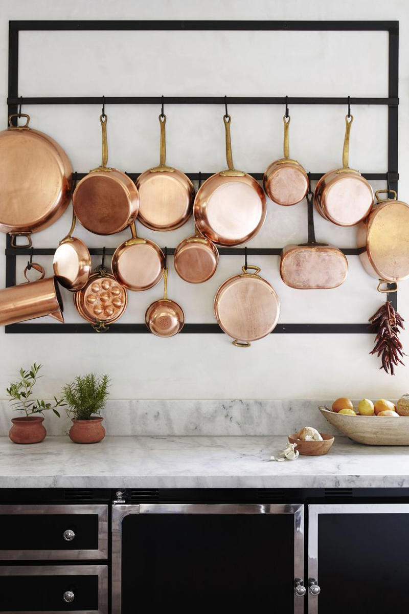 22) Mount a Metal Rack 10) Take a Maximalist Approach, 16) Make the Most of Kitchen Corners, 17) Bring in a Dining Table, 18) Mount a Metal Rack, 20) Keep It Classic, 21) Let Counters Play Double Duty, 24) Install a Pegboard Wall, 25) Add Sleek Open Shelving, 26) Go Big With Art, 29) Infuse Color With Tiles, 34) Add Task Lighting, 36) Go Bold on Top, Neutral on Bottom, 39) Get Smart With Floating Shelves, 40) Keep Most-Used Items on Shelves, 41) Extend Tile from Countertop to Ceiling, 44) Disguise Your Dishwasher, 45) Double up on Pattern and Color, 46) Try Backless Stools, 47) Craft a Wine Nook, 48) Invest in a Rolling Kitchen Cart, 49) Use Vertical Space