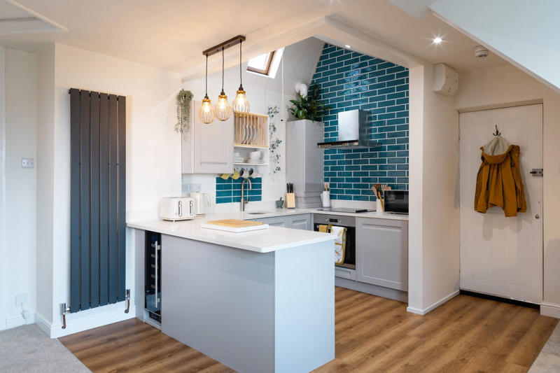 1) Infuse Color With Tiles 10) Take a Maximalist Approach, 16) Make the Most of Kitchen Corners, 17) Bring in a Dining Table, 18) Mount a Metal Rack, 20) Keep It Classic, 21) Let Counters Play Double Duty, 24) Install a Pegboard Wall, 25) Add Sleek Open Shelving, 26) Go Big With Art, 29) Infuse Color With Tiles, 34) Add Task Lighting, 36) Go Bold on Top, Neutral on Bottom, 39) Get Smart With Floating Shelves, 40) Keep Most-Used Items on Shelves, 41) Extend Tile from Countertop to Ceiling, 44) Disguise Your Dishwasher, 45) Double up on Pattern and Color, 46) Try Backless Stools, 47) Craft a Wine Nook, 48) Invest in a Rolling Kitchen Cart, 49) Use Vertical Space