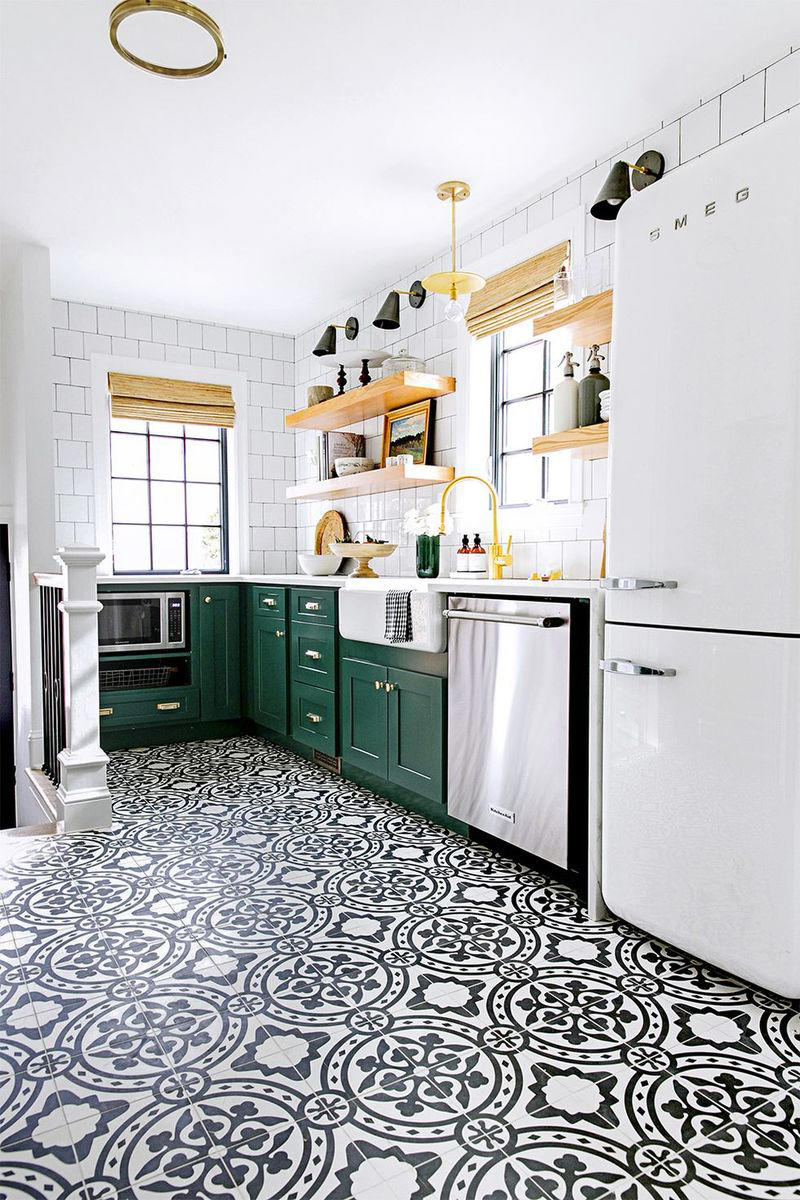31) Double up on Pattern and Color 10) Take a Maximalist Approach, 16) Make the Most of Kitchen Corners, 17) Bring in a Dining Table, 18) Mount a Metal Rack, 20) Keep It Classic, 21) Let Counters Play Double Duty, 24) Install a Pegboard Wall, 25) Add Sleek Open Shelving, 26) Go Big With Art, 29) Infuse Color With Tiles, 34) Add Task Lighting, 36) Go Bold on Top, Neutral on Bottom, 39) Get Smart With Floating Shelves, 40) Keep Most-Used Items on Shelves, 41) Extend Tile from Countertop to Ceiling, 44) Disguise Your Dishwasher, 45) Double up on Pattern and Color, 46) Try Backless Stools, 47) Craft a Wine Nook, 48) Invest in a Rolling Kitchen Cart, 49) Use Vertical Space