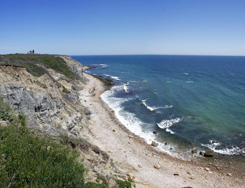 Rhode Island: Mohegan Bluffs Illinois: Garden of the Gods, Indiana: Indiana Dunes National Lakeshore, Iowa: Maquoketa Caves, Michigan: Kitch-iti-Kipi, Minnesota: Palisade Head, Nebraska: Platte River, North Carolina: Chimney Rock, North Dakota: Theodore Roosevelt National Park, Oregon: Crater Lake, Rhode Island: Mohegan Bluffs, South Carolina: Hunting Island, South Dakota: Badlands National Park, Utah: Bryce Canyon, Vermont: Lake Willoughby, Virginia: Natural Bridge, Washington: Blanca Lake