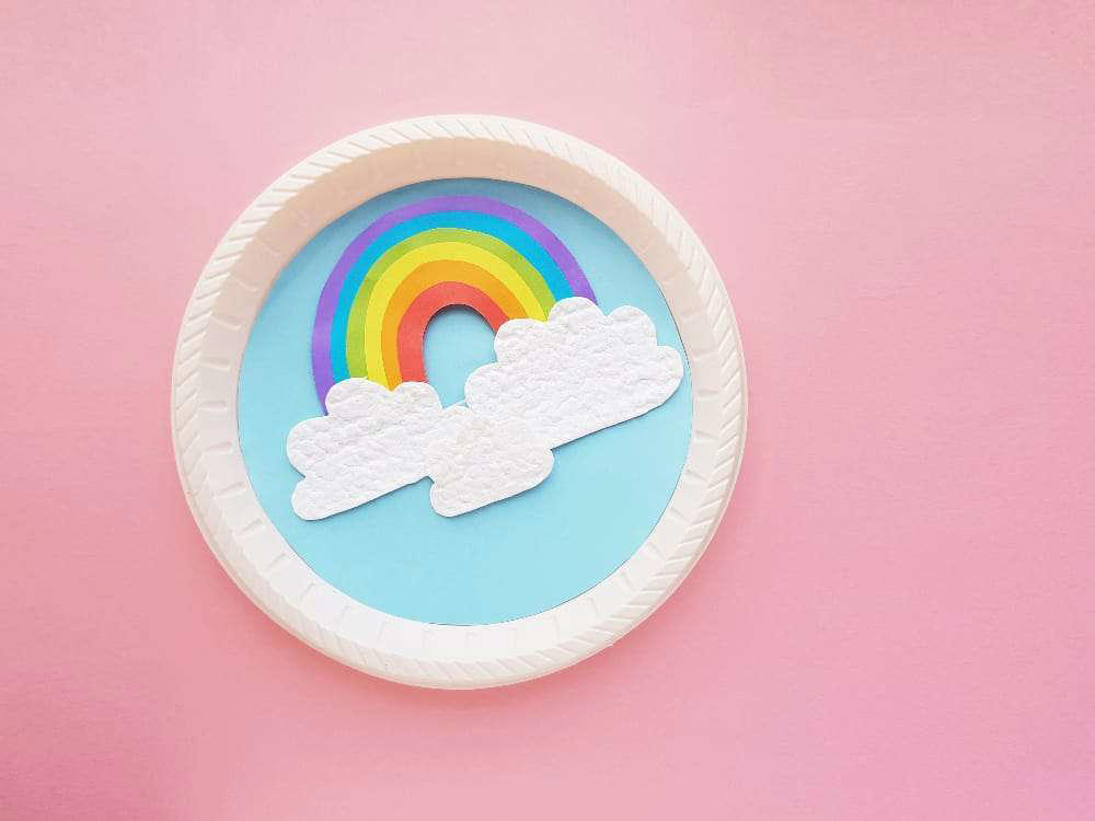 Rainbow Bridge STEM Project by STEAM Powered Family, Paper Plate Rainbow Craft by Little Ladoo, Stained Glass Rainbow Suncatcher by Mombrite, Deconstructed Rainbow Collage Art by Barley &amp; Birch, Edible Rainbow Kid Activity by Finding Zest