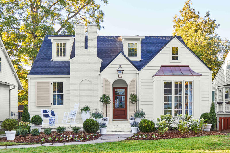 Why Curb Appeal Is Important, According To Experts, Add a Garden Path, Tidy Your Landscaping, Choose Plants That Thrive, Power-Wash Your Patio, Upgrade Your Garage Door, Flank Your Entry, Paint Strategically, Don’t Overlook Your Hardware, Opt for Architectural Lighting, Incorporate Natural Elements