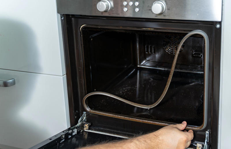What not to do with your home gadgets, Not replacing range hood filters, Mounting a TV above a fireplace, Abandoning the iron, Ignoring a loose oven door seal, Ignoring rust on dishwasher tines, Not caring for the washing machine, Overlooking washing machine mechanisms, Not cleaning the blender immediately, Grilling with the door closed, Failing to descale the kettle, Opening the microwave door during cooking, Ignoring broken fridge gaskets, Overlooking air-conditioning filters, Overloading appliances, Forgetting about the hairdryer, Neglecting the freezer, Abandoning refrigerator coils, Misusing the garbage disposal, Overlooking the showerhead, Leaving the microwave switched on