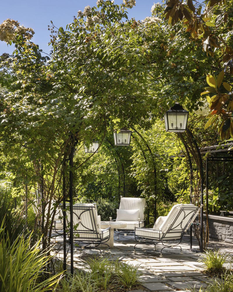 Plot Beautiful Pathways, Incorporate Lighting, Plant a Low-Maintenance, Sustainable Garden, Develop Outdoor Living Spaces, Make Difficult Terrain Usable, Keep Up with Maintenance