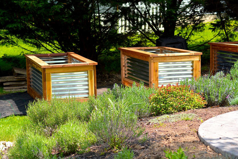 1) Make Them Waist Height, 3) Carve a Path, 4) Add Grid Wiring, 5) Use Brick, 10) Build in Steps, 11) Spring for Stone, 13) Choose Colorful Planters, 16) Make Your Own Meadow, 19) Opt for a Bucket, 20) Try Square Foot Gardening, 21) Surround a Shed, 22) Mix the Materials, 23) Work the Angles, 25) Tier the Planters, 26) Incorporate Scenic Pathways, 27) Mix and Match Your Vessels, 28) Think Outside the Box, 29) Automate Your Chores, 30) Add a Bit of Quirk