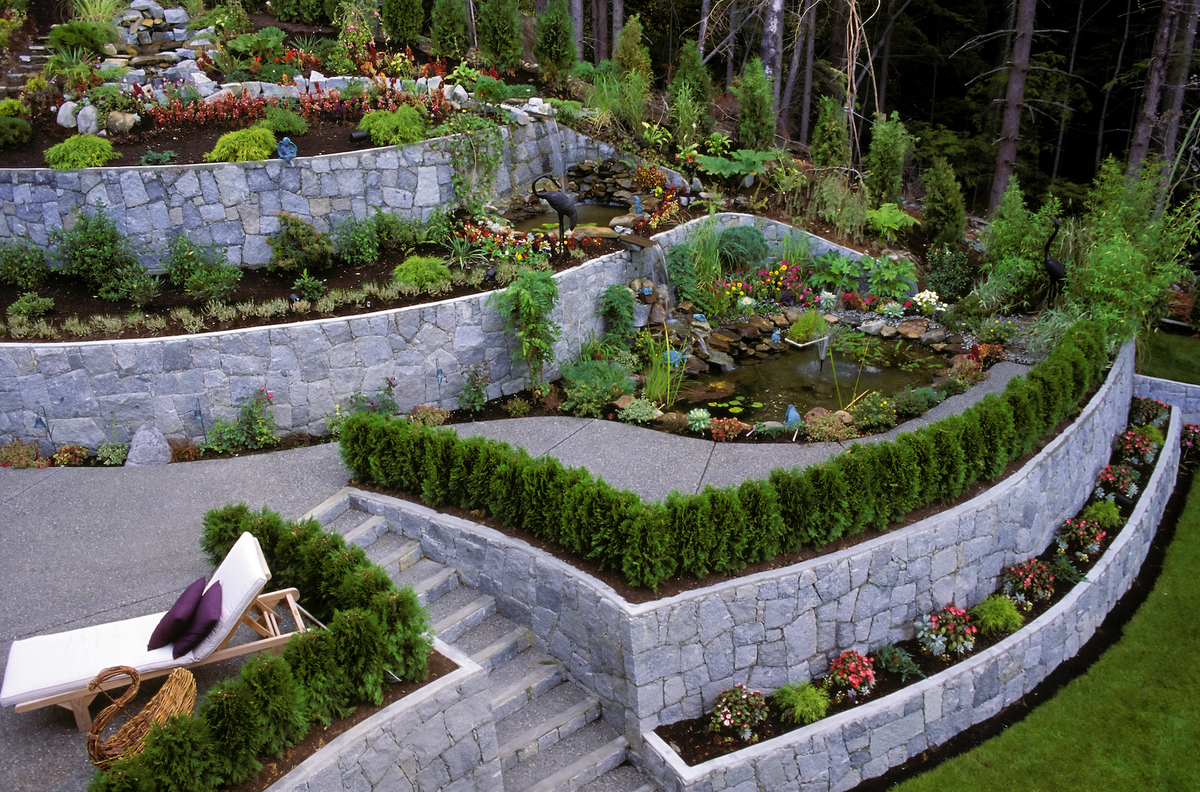 1) Make Them Waist Height, 3) Carve a Path, 4) Add Grid Wiring, 5) Use Brick, 10) Build in Steps, 11) Spring for Stone, 13) Choose Colorful Planters, 16) Make Your Own Meadow, 19) Opt for a Bucket, 20) Try Square Foot Gardening, 21) Surround a Shed, 22) Mix the Materials, 23) Work the Angles, 25) Tier the Planters, 26) Incorporate Scenic Pathways, 27) Mix and Match Your Vessels, 28) Think Outside the Box, 29) Automate Your Chores, 30) Add a Bit of Quirk