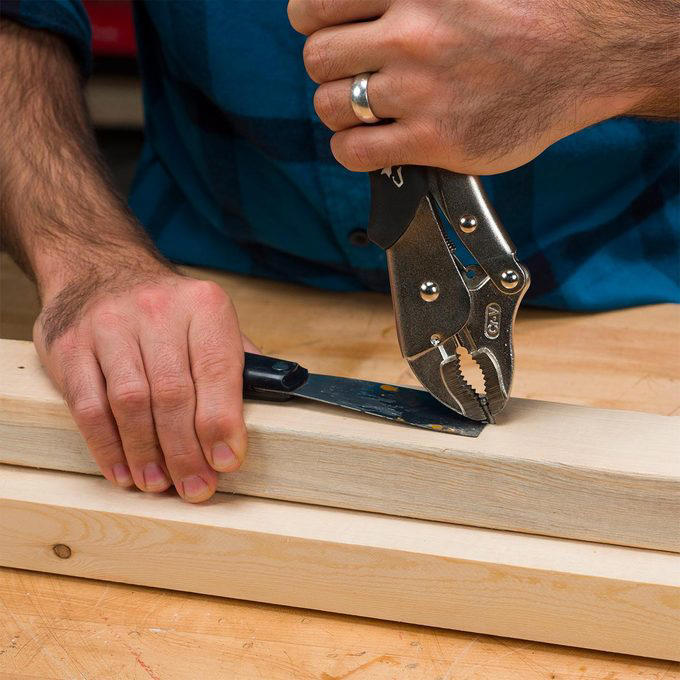 Quick Woodworking File, Check Out These Hand Tool Hacks and Modifications for Woodworking:, Custom Pads for a Mechanic’s Vise, More Planing, Less Exercise, Always Know Where to Find Your Paint Can Opener, Use a Sneaker to Clean Sandpaper, How to Magnetize a Screwdriver, Hands-Free Light Hack, Brush with a Drill, Kitty Litter Pouch for Tool Protection, Two Sizes of Brad Nails in One Gun, Caulk Gun Clamp, Hammer Cushion, Check if Your Square is Square, How to Fix a Square, Lighted Screwdriver Hack, Compressor Creeper, Saddles for Sawhorses, Bobby Pin Nail Holder, Hooks for Drill Storage, Vise-Grips to Pull Nails, Circle Gets the Square, Customized Chuck Key, Flush-Cutting Hacksaw, Last-Ditch Nail Pulling, Long-Reach Screwdriver, Longer-Lasting Utility Blade, Mini Drywall Saw, No-Dent Nail Finishing, PVC Sanding Files, Make Your Own Awl, Wrench for Rounded Bolts, Hang Your Roofing Tools, Clamp With a Tie-Down Strap, Mix Concrete with a Rake, Make Mini Roller Covers, Use a Level to Extend Your Table Saw Fence, Use a Drill to Dig Through Hard Soil, Make a Blade for Cutting Foam, Lift Doors With a Flat Pry Bar, Hammer Measuring Stick, PVC Hammer Holder, Quick-Draw Hammer Storage, More Leverage for Pulling Nails, Free Finger Saver, Hammer Lumber Splitter, Homemade Hammer Mallet, Hammer Extension, Maximize Your Hammer Power, Get Rid of Caked-On Drywall, Safer Trim Nailing, Help with Paint-Clogged Screw Heads, PVC Blade Storage, Quick and Easy Pilot Holes, Instant Magnetic Screw Holder, Give Yourself a Little Give, A Simple Drill Depth Stop, Super-Long Bit Extender, Make a Squeegee From a Rake, Gentle-Grip Pliers, Use a Rubber Band to Grip Stripped Screws, Rubber Band Bolt Holder, Long Reach Shears, Handy Rake Handle, Drill Bit Girdle, Pallet Dolly