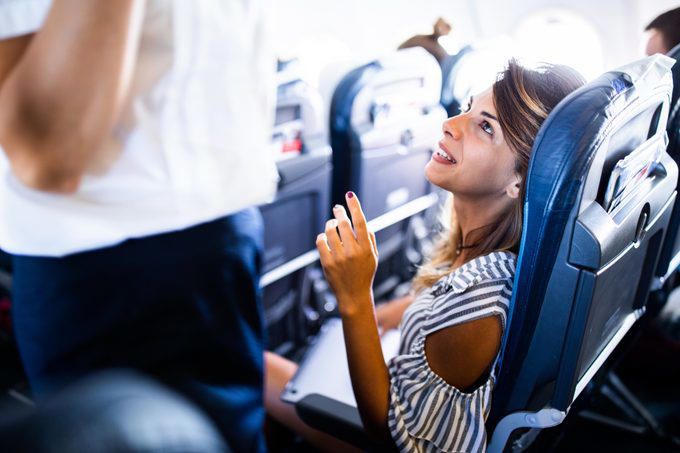 The dos and don’ts of flying, Enforcing the rules for other passengers, Organizing the overhead bins, Tugging their sleeve to get their attention, Asking them to fill your reusable water bottle, Serving yourself from the drink cart, Handing them a dirty diaper to throw away, Stowing your carry-on too carefully, Calling them over to chat, Flirting with them, Not letting them know you’re terrified of flying, Throwing away other people’s trash, Calling them by a term of endearment, Thanking the pilot at the end of the flight, More midflight missteps