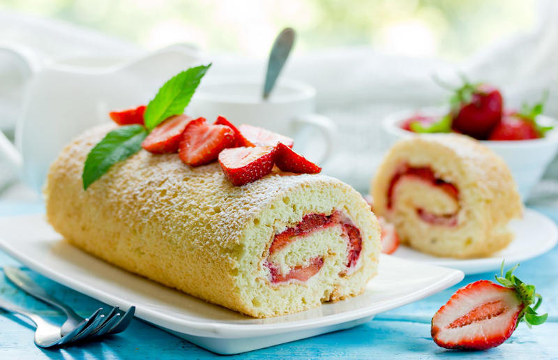 9. Swiss roll, Central Europe 44. Fondant fancies, England, UK, 43. Castella, Japan, 42. Parkin, England, UK, 41. German chocolate cake, USA, 40. Fraisier, France, 39. Amandine, Romania, 38. Barmbrack, Ireland, 37. Rigó Jancsi, Hungary, 36. Foi thong cake, Thailand, 35. Brigadeiro, Brazil, 34. Hummingbird cake, Jamaica, 33. King cake, USA, 32. Basbousa, Egypt, 31. Dundee cake, Scotland, UK, 30. Angel food cake, USA, 29. Rum cake, Caribbean, 28. Madeira cake, UK, 27. Ice cream cake, various locations, 26. Pineapple upside-down cake, USA, 25. Portokalopita, Greece, 24. Bienenstich, Germany, 23. Persian love cake, Iran, 22. Chajá, Uruguay, 21. Kvæfjordkake, Norway, 20. Tunnel of fudge cake, USA, 19. Malva pudding, South Africa, 18. Jamaican ginger cake, Jamaica and UK, 17. Medovik, Russia, 16. Funfetti cake, USA, 15. Lamingtons, Australia, 14. Battenberg, England, UK, 13. Sachertorte, Austria, 12. Opera cake, France, 11. Maple cake, Canada, 10. Lapis legit, Indonesia, 9. Swiss roll, Central Europe, 8. Banana bread, USA, 7. Lemon drizzle cake, England, UK, 6. Carrot cake, various locations, 5. Schwarzwälder Kirschtorte, Germany, 4. Tres leches cake, Latin America, 3. Victoria sponge, England, UK, 2. Red velvet cake, USA