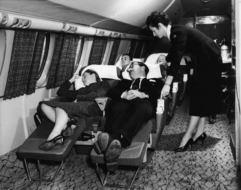 Reclining seats included footrests and leaned almost all the way back., The first-class cabin's gourmet dining remained., Flutes of Champagne were an added bonus., Spiral staircases led to the 747's upper deck lounge., Some early jumbo jets were even equipped with pianos., The massive double-decker entered service with Singapore Airlines in 2007., Two suites could even be merged to create a couple's suite., Emirates has also launched its own first-class suites., Amenities include access to an in-flight shower., However, the ultimate first-class experience comes courtesy of Etihad., Each 125-square-foot, three-room suite features an en suite bathroom with a shower., It also includes a private bedroom and a personal butler., Two suites can be joined to create a two-passenger mega-suite.