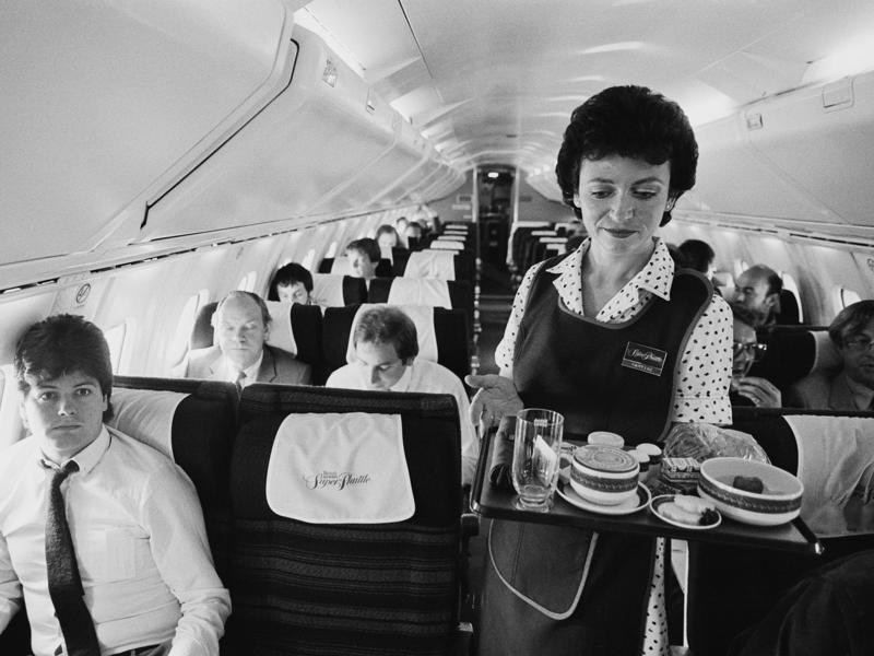 Reclining seats included footrests and leaned almost all the way back., The first-class cabin's gourmet dining remained., Flutes of Champagne were an added bonus., Spiral staircases led to the 747's upper deck lounge., Some early jumbo jets were even equipped with pianos., The massive double-decker entered service with Singapore Airlines in 2007., Two suites could even be merged to create a couple's suite., Emirates has also launched its own first-class suites., Amenities include access to an in-flight shower., However, the ultimate first-class experience comes courtesy of Etihad., Each 125-square-foot, three-room suite features an en suite bathroom with a shower., It also includes a private bedroom and a personal butler., Two suites can be joined to create a two-passenger mega-suite.